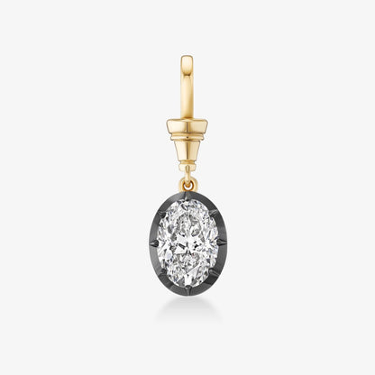 A silver-toned round pendant necklace featuring a pavé-set round center stone surrounded by a halo of small clear stones, suspended from a silver curb chain on a white background.