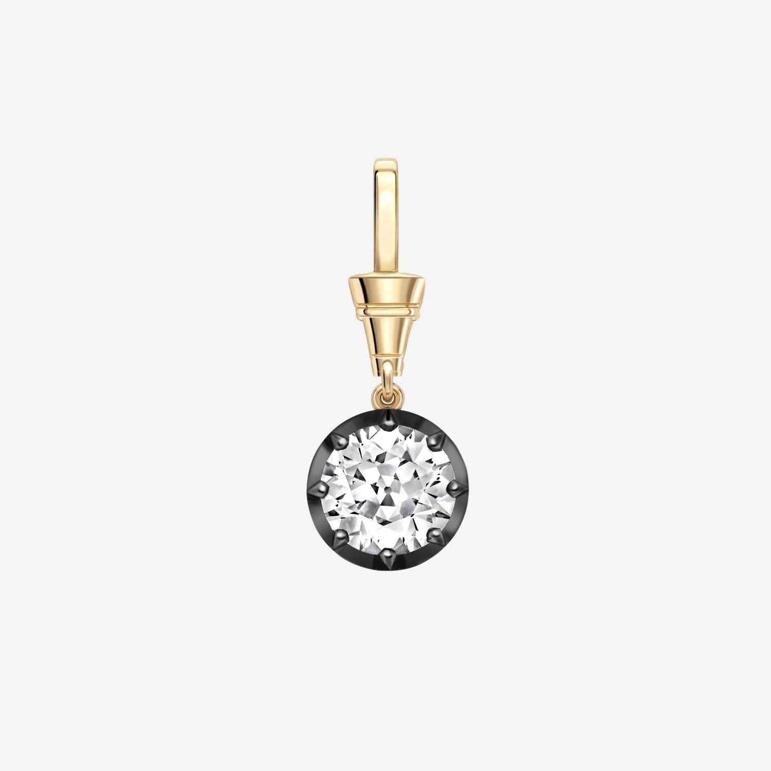 A gold leverback earring featuring a round bezel-set clear gemstone on a light gray background.