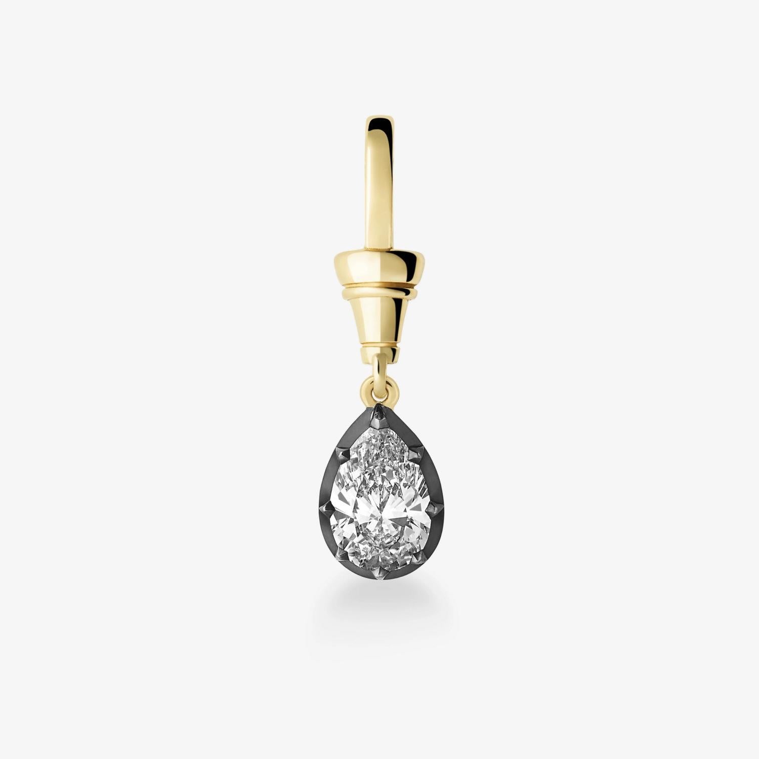 A single gold drop earring featuring a teardrop-shaped clear gemstone set in a dark metal bezel, shown against a plain light gray background.