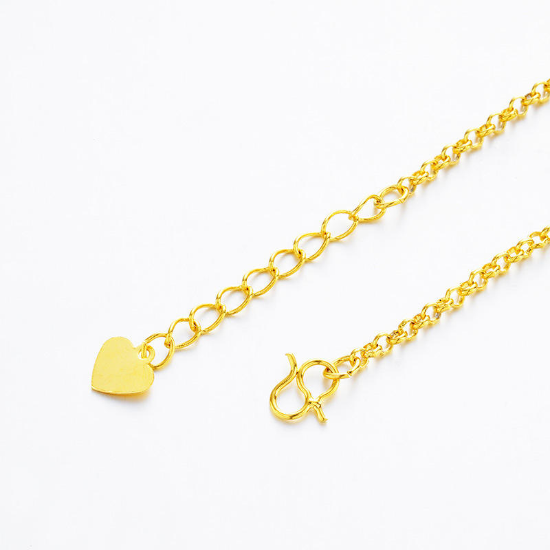 A gold chain necklace featuring a small, polished gold heart charm and a lobster clasp, displayed on a clean white background.