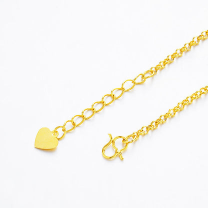 A gold chain necklace featuring a small, polished gold heart charm and a lobster clasp, displayed on a clean white background.